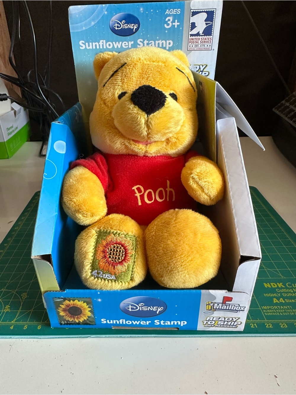 Disney Winnie the Pooh Yellow Plush with Red Shirt and Sunflower Stamp (2008)